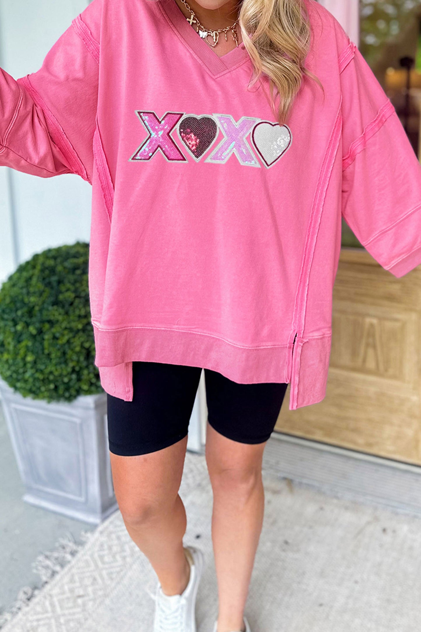 Bonbon Raw Seam Detail XOXO Sequin Patched Graphic V Neck 3/4 Sleeve Top