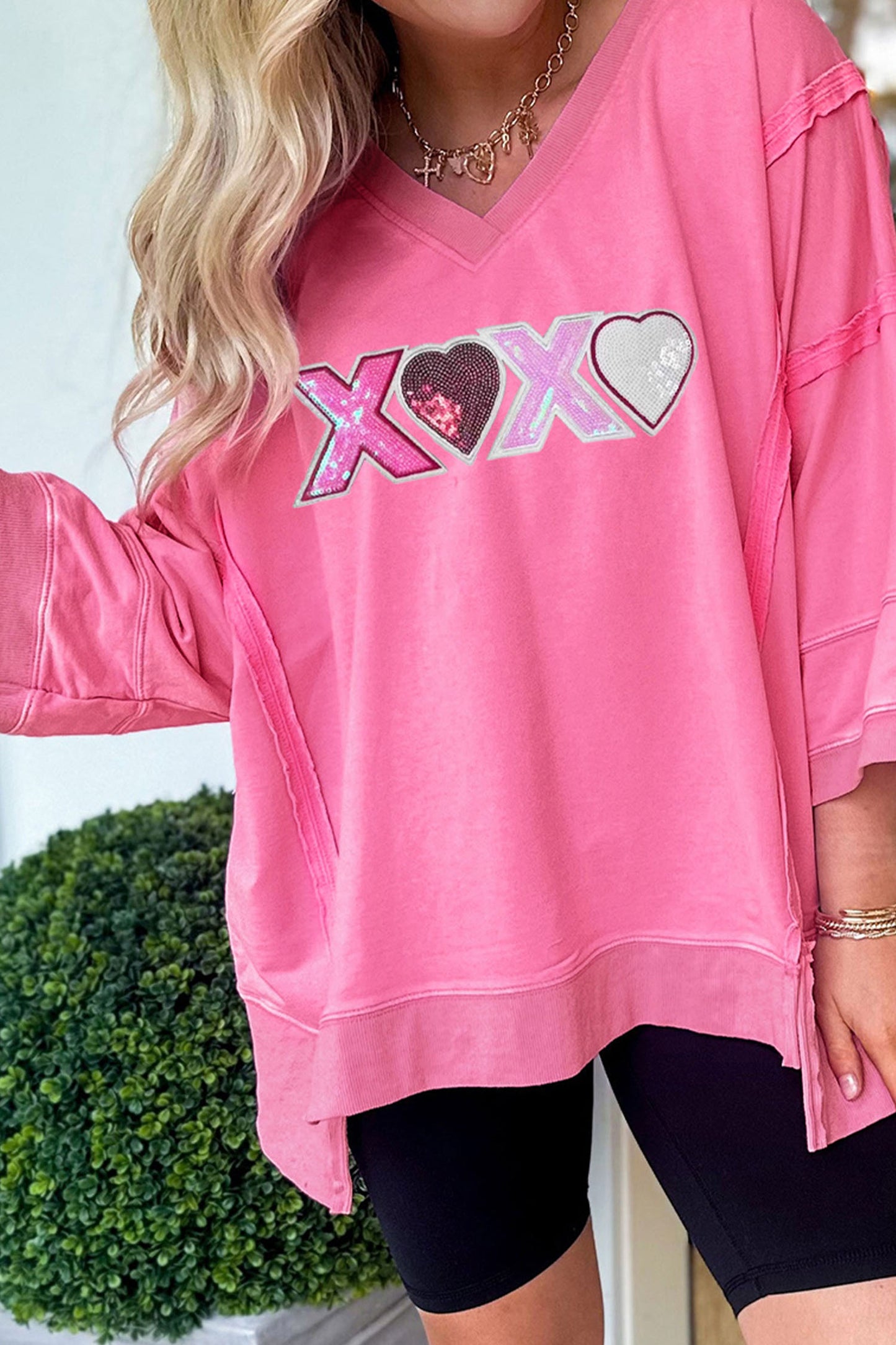 Bonbon Raw Seam Detail XOXO Sequin Patched Graphic V Neck 3/4 Sleeve Top